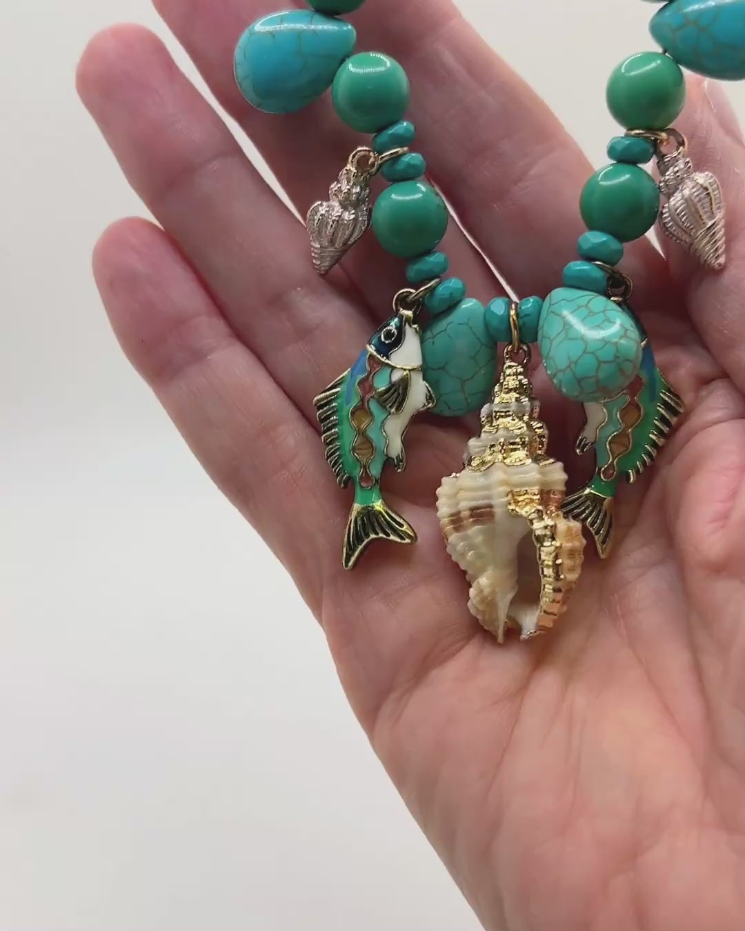 Load video: Genuine Turquoise Fish Charm Necklace
